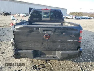 2022 Nissan Frontier Pro-4X z VIN 1N6ED1EK4NN686366, wystawiony jako Copart lot #46265815 z przebiegiem 50 753 mil mil oraz Szkoda całkowita • Salvage title. Historia ofert i sprzedaży dostępna na DreamBid. Obrazek 6.