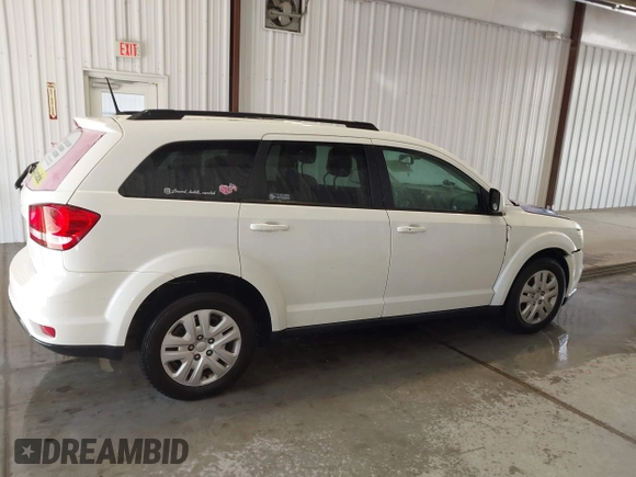 2019 Dodge Journey SE with VIN 3C4PDCBBXKT835029, listed as a IAAI auction lot 42120482 with 130,282 mi miles and . Bid and sale history available at DreamBid. Image 13.