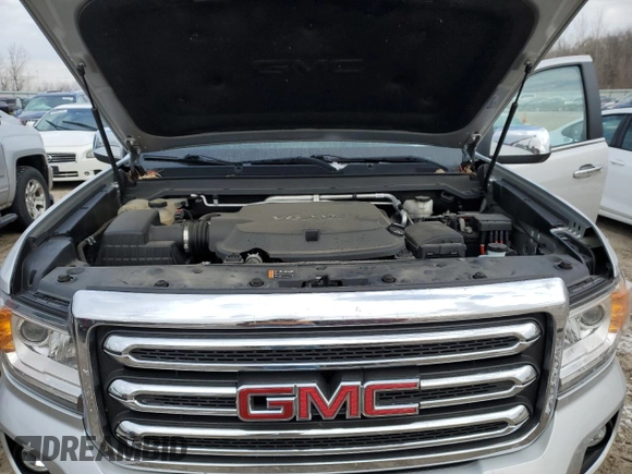 2019 GMC Canyon 4WD SLT with VIN 1GTG6DEN7K1134168, listed as a Copart auction lot 86510834 with 61,889 mi miles and Salvage Title. Bid and sale history available at carsss.com. Image 12.