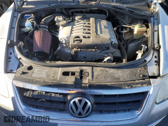 2004 Volkswagen Touareg z VIN WVGBC67L94D021426, wystawiony jako Copart lot #44059535 z przebiegiem 148 887 mil mil oraz Czysty tytuł • Clean title. Historia ofert i sprzedaży dostępna na DreamBid. Obrazek 12.