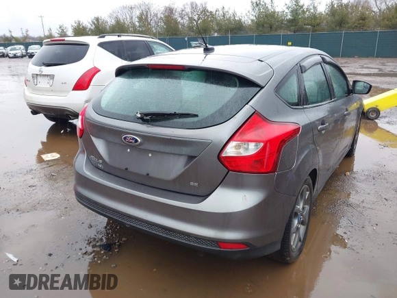 2013 Ford Focus SE with VIN 1FADP3K25DL186285, listed as a IAAI auction lot 41729017 with 188,853 mi miles. Bid and sale history available at carsss.com. Image 4.