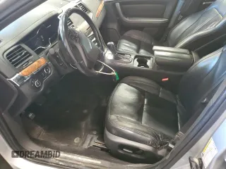 2013 Lincoln MKS z VIN 1LNHL9EK0DG605184, wystawiony jako Copart lot #51914305 z przebiegiem 173 117 mil mil oraz Szkoda całkowita • Salvage title. Historia ofert i sprzedaży dostępna na DreamBid. Obrazek 7.