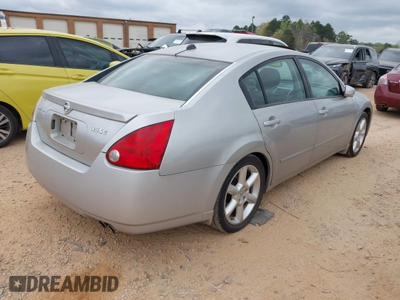 2004 Nissan Maxima SE z VIN 1N4BA41E74C869440, wystawiony jako IAAI lot #41886525 z przebiegiem 130 327 mil mil oraz . Historia ofert i sprzedaży dostępna na DreamBid. Obrazek 4.