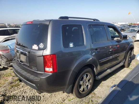 2011 Honda Pilot Touring z VIN 5FNYF4H94BB046303, wystawiony jako Copart lot #58017515 z przebiegiem 118 384 mil mil oraz Szkoda całkowita • Salvage title. Historia ofert i sprzedaży dostępna na DreamBid. Obrazek 3.