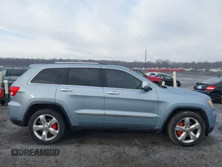 2013 Jeep Grand Cherokee Overland with VIN 1C4RJFCT2DC572978, listed as a IAAI auction lot 41468915 with 223,528 mi miles. Bid and sale history available at carsss.com. Image 13.