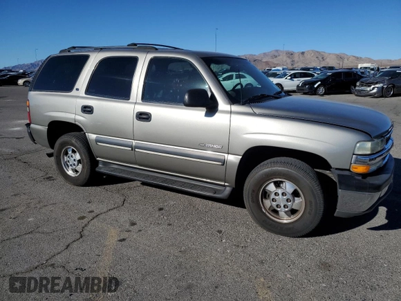 2002 Chevrolet Tahoe LS with VIN 1GNEC13V82R153063, listed as a Copart auction lot 84180594 with 148,190 mi miles and Salvage Title. Bid and sale history available at carsss.com. Image 4.
