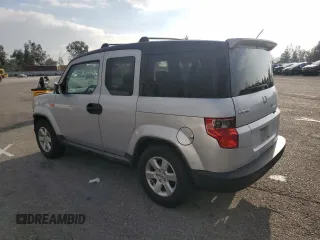2010 Honda Element EX with VIN 5J6YH1H76AL003336, listed as a Copart auction lot 89178895 with 126,907 mi miles and Salvage Title. Bid and sale history available at DreamBid. Image 2.