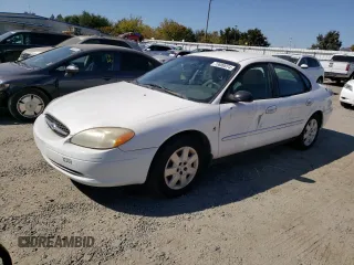 2001 Ford Taurus z VIN 1FAFP52271A252959, wystawiony jako Copart lot #73800074 z przebiegiem 83 872 mil mil oraz Tytuł czysty. Historia ofert i sprzedaży dostępna na DreamBid. Obrazek 1.