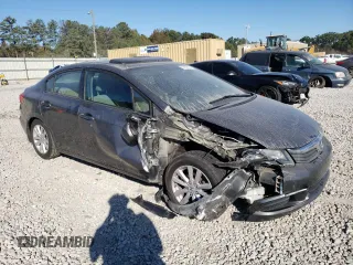 2012 Honda Civic EX-L with VIN 19XFB2F94CE048523, listed as a Copart auction lot 77019404 with 210,391 mi miles and Salvage Title. Bid and sale history available at DreamBid. Image 4.