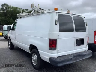 2012 Ford Econoline Cargo Commercial with VIN 1FTNE2EL8CDB14959, listed as a IAAI auction lot 42306978 with 158,291 mi miles and . Bid and sale history available at DreamBid. Image 1.
