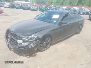 2023 BMW 5 Series M550i xDrive with VIN WBA13BK02PCN47443, listed as a IAAI auction lot 42290388 with Not provided miles and . Bid and sale history available at DreamBid. Image 2.