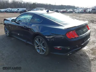 2021 Ford Mustang GT with VIN 1FA6P8CF0M5133019, listed as a IAAI auction lot 41534938 with 65,526 mi miles. Bid and sale history available at carsss.com. Image 3.