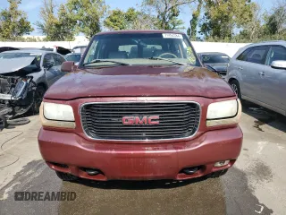 1999 GMC Denali z VIN 1GKEK13RXXR910328, wystawiony jako Copart lot #71494384 z przebiegiem 251 016 mil mil oraz Szkoda całkowita • Salvage title. Historia ofert i sprzedaży dostępna na DreamBid. Obrazek 5.