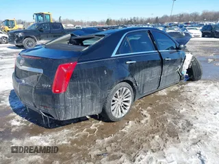 2014 Cadillac CTS Luxury AWD with VIN 1G6AX5SX3E0191673, listed as a IAAI auction lot 41617087 with 68,581 mi miles and . Bid and sale history available at DreamBid. Image 4.