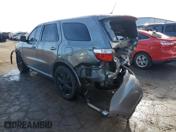 2012 Dodge Durango R/T with VIN 1C4SDHCT3CC188243, listed as a Copart auction lot 40917114 with 145,409 mi miles and Salvage title. Bid and sale history available at DreamBid. Image 2.