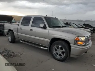 2005 GMC Sierra Denali z VIN 2GTEK63N951254277, wystawiony jako Copart lot #47635015 z przebiegiem 177 167 mil mil oraz Szkody całkowita. Historia ofert i sprzedaży dostępna na DreamBid. Obrazek 4.