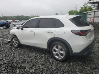 2023 Honda HR-V LX with VIN 3CZRZ2H32PM715175, listed as a Copart auction lot 56970815 with 37,217 mi miles and Salvage title. Bid and sale history available at DreamBid. Image 2.
