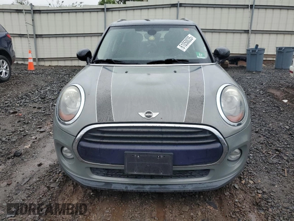 2016 MINI Hardtop 4 Door with VIN WMWXU1C53G2D08231, listed as a Copart auction lot 61050035 with 128,267 mi miles and Salvage title. Bid and sale history available at DreamBid. Image 5.
