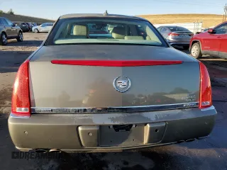 2010 Cadillac DTS 1SD z VIN 1G6KH5EY8AU108702, wystawiony jako Copart lot #76286984 z przebiegiem 177 455 mil mil oraz Szkoda całkowita • Salvage title. Historia ofert i sprzedaży dostępna na DreamBid. Obrazek 6.