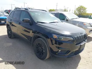 2023 Jeep Cherokee Altitude Lux with VIN 1C4PJMMB9PD111700, listed as a IAAI auction lot 41844750 with 57,441 mi miles. Bid and sale history available at carsss.com. Image 1.