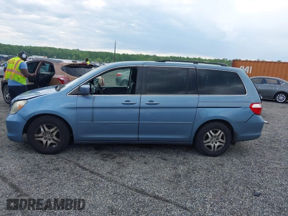 2007 Honda Odyssey EX z VIN 5FNRL38467B087065, wystawiony jako IAAI lot #42204370 z przebiegiem 242 844 mil mil oraz . Historia ofert i sprzedaży dostępna na DreamBid. Obrazek 15.