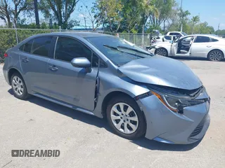 2023 Toyota Corolla LE with VIN 5YFB4MDE9PP016692, listed as a IAAI auction lot 42136141 with 34,671 mi miles. Bid and sale history available at carsss.com. Image 1.