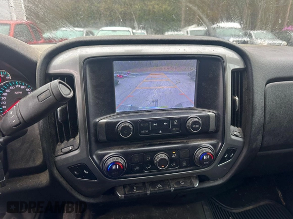 2015 Chevrolet Silverado 1500 LT with VIN 1GCVKRECXFZ221116, listed as a Copart auction lot 56621055 with 198,583 mi miles and Clean Title. Bid and sale history available at DreamBid. Image 9.