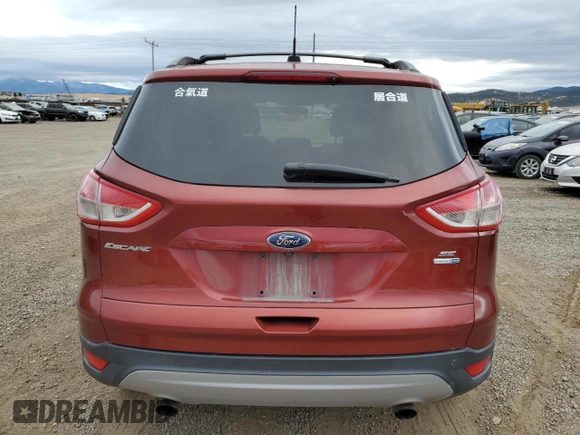 2015 Ford Escape SE with VIN 1FMCU9GX6FUC67715, listed as a Copart auction lot 73495244 with 184,183 mi miles and Salvage Title. Bid and sale history available at DreamBid. Image 6.