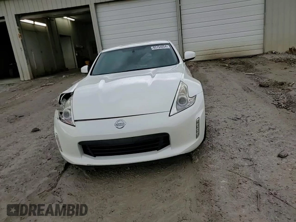 2013 Nissan 370Z Touring z VIN JN1AZ4EH5DM383466, wystawiony jako Copart lot #85704054 z przebiegiem 37 892 mil mil oraz Szkoda całkowita • Salvage title. Historia ofert i sprzedaży dostępna na DreamBid. Obrazek 13.