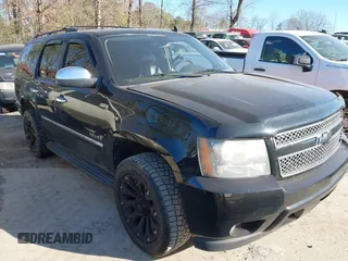 2011 Chevrolet Tahoe LTZ z VIN 1GNSCCE0XBR366774, wystawiony jako IAAI lot #41672681 z przebiegiem 219 169 mil mil oraz . Historia ofert i sprzedaży dostępna na DreamBid. Obrazek 1.