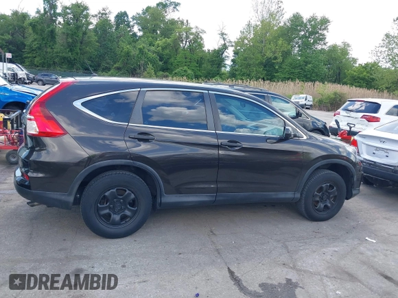 2015 Honda CR-V LX with VIN 2HKRM4H38FH601802, listed as a IAAI auction lot 42177101 with 71,775 mi miles and . Bid and sale history available at DreamBid. Image 14.