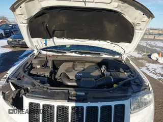 2014 Jeep Grand Cherokee Limited with VIN 1C4RJFBG7EC220677, listed as a IAAI auction lot 41177354 with 148,445 mi miles and . Bid and sale history available at DreamBid. Image 10.