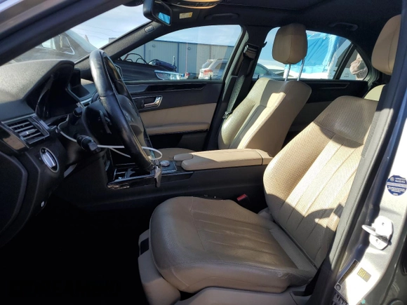 2011 Mercedes-Benz E 550 Luxury with VIN WDDHF7CB8BA305630, listed as a Copart auction lot 41521955 with 141,587 mi miles and Salvage Title. Bid and sale history available at DreamBid. Image 7.