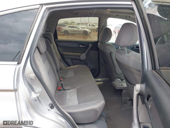 2007 Honda CR-V EX with VIN JHLRE38597C023461, listed as a IAAI auction lot 41871291 with 250,813 mi miles. Bid and sale history available at carsss.com. Image 7.