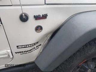 2014 Jeep Wrangler Unlimited Sport with VIN 1C4BJWDG9EL135077, listed as a IAAI auction lot 42324775 with 104,221 mi miles and . Bid and sale history available at DreamBid. Image 6.