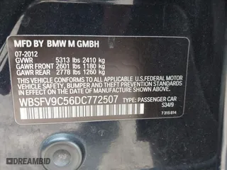 2013 BMW M5 with VIN WBSFV9C56DC772507, listed as a IAAI auction lot 40109662 with 127,881 mi miles. Bid and sale history available at carsss.com. Image 9.