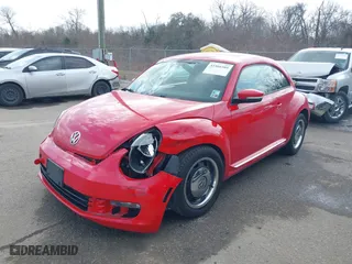 2012 Volkswagen Beetle 2.5L PZEV with VIN 3VWJP7AT4CM608099, listed as a IAAI auction lot 41566505 with 130,189 mi miles. Bid and sale history available at carsss.com. Image 17.