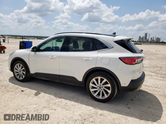 2021 Ford Escape Titanium Hybrid z VIN 1FMCU0DZ6MUA03327, wystawiony jako Copart lot #59558845 z przebiegiem 67 569 mil mil oraz Czysty tytuł • Clean title. Historia ofert i sprzedaży dostępna na DreamBid. Obrazek 2.