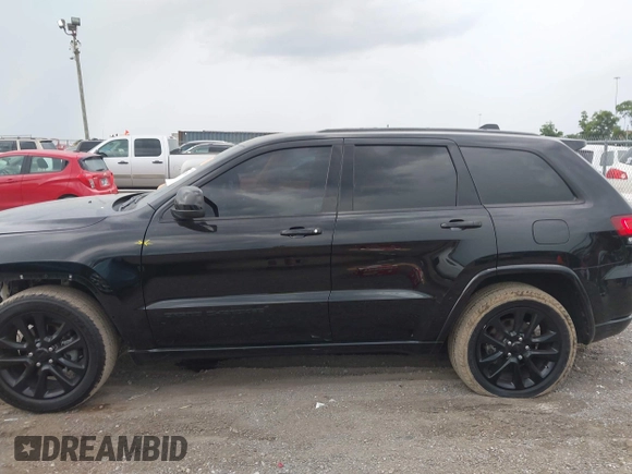 2020 Jeep Grand Cherokee Laredo E with VIN 1C4RJEAG7LC324904, listed as a IAAI auction lot 42600961 with 93,444 mi miles and . Bid and sale history available at DreamBid. Image 14.