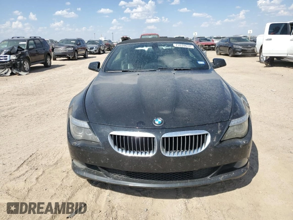 2010 BMW 6 Series 650i z VIN WBAEB5C52AC225960, wystawiony jako Copart lot #71639634 z przebiegiem 114 696 mil mil oraz Czysty tytuł • Clean title. Historia ofert i sprzedaży dostępna na DreamBid. Obrazek 5.