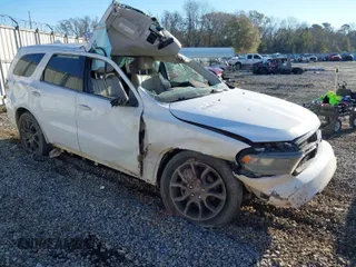 2016 Dodge Durango Limited with VIN 1C4RDHDG3GC424296, listed as a IAAI auction lot 41359675 with 141,000 mi miles. Bid and sale history available at carsss.com. Image 1.