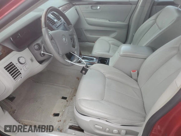 2011 Cadillac DTS Premium Collection z VIN 1G6KH5E66BU122873, wystawiony jako Copart lot #55515185 z przebiegiem 84 092 mil mil oraz Szkoda całkowita • Salvage title. Historia ofert i sprzedaży dostępna na DreamBid. Obrazek 7.