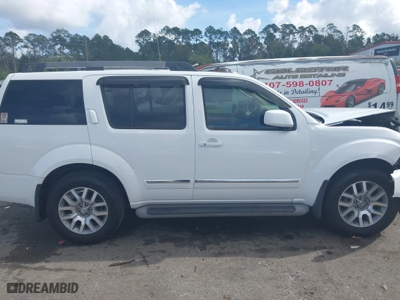 2012 Nissan Pathfinder SV with VIN 5N1AR1NN1CC616194, listed as a IAAI auction lot 40821219 with 104,698 mi miles. Bid and sale history available at carsss.com. Image 13.