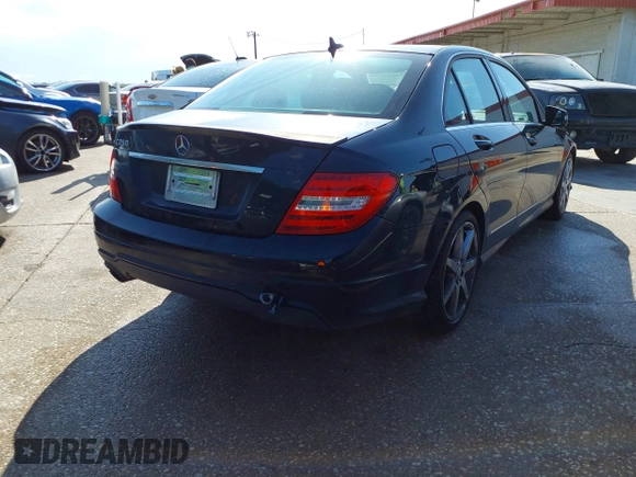 2014 Mercedes-Benz C-Class C 250 Sport with VIN WDDGF4HB1EA958114, listed as a IAAI auction lot 42101249 with 85,100 mi miles. Bid and sale history available at carsss.com. Image 4.