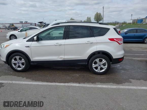 2016 Ford Escape SE with VIN 1FMCU0GX4GUC55365, listed as a IAAI auction lot 41901838 with 72,913 mi miles. Bid and sale history available at carsss.com. Image 14.