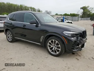 2021 BMW X5 xDrive40i with VIN 5UXCR6C08M9D83268, listed as a Copart auction lot 51781335 with 97,885 mi miles and Salvage title. Bid and sale history available at DreamBid. Image 4.