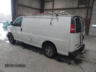2006 Chevrolet Express Cargo Van with VIN 1GCFG15X861262059, listed as a IAAI auction lot 41803770 with 199,997 mi miles. Bid and sale history available at carsss.com. Image 3.