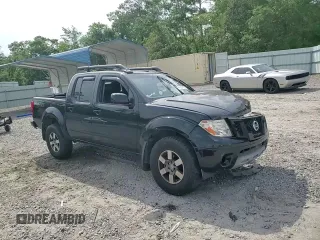 2012 Nissan Frontier Pro-4X z VIN 1N6AD0EV4CC405470, wystawiony jako Copart lot #54186715 z przebiegiem Nie podano mil oraz Szkoda całkowita • Salvage title. Historia ofert i sprzedaży dostępna na DreamBid. Obrazek 13.