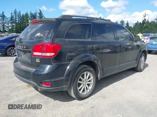 2015 Dodge Journey SXT z VIN 3C4PDCBG5FT742257, wystawiony jako IAAI lot #42577447 z przebiegiem 128 816 mil mil oraz . Historia ofert i sprzedaży dostępna na DreamBid. Obrazek 4.