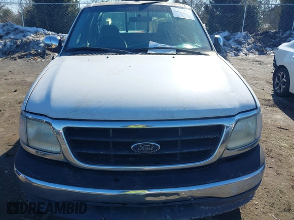 2000 Ford F-150 z VIN 2FTPX17L7YCA51774, wystawiony jako IAAI lot #41426958 z przebiegiem 421 412 mil mil oraz . Historia ofert i sprzedaży dostępna na DreamBid. Obrazek 12.